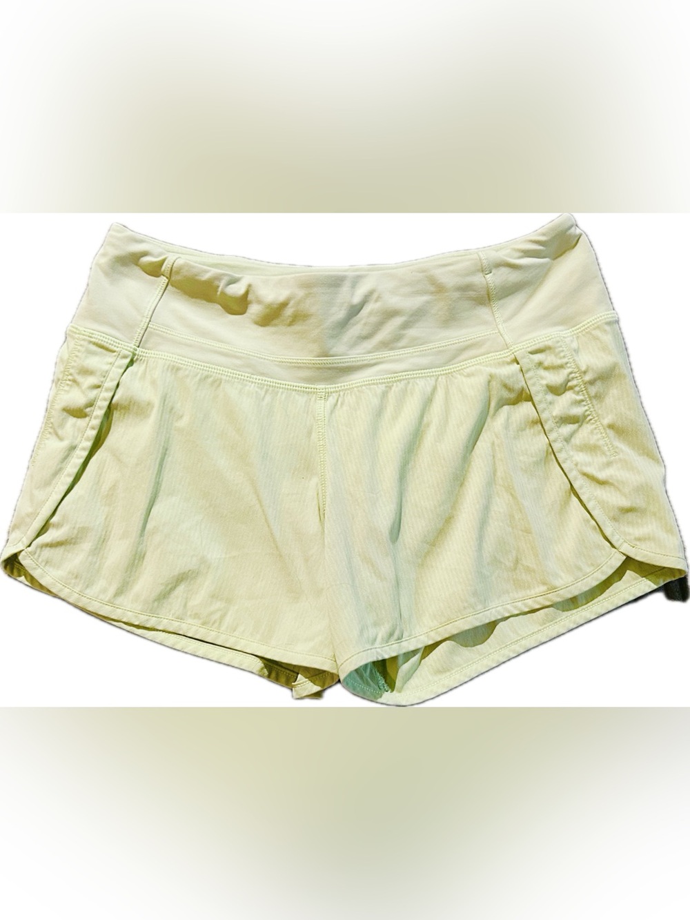 Lululemon Run: Speed Shorts - Size Dot 4. Color Elixir (pastel yellow-green).